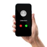 Phone call from unknown number. Man getting a call on phone from